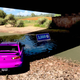 A Mitsubishi Lancer drives on a riverbank next to a bonus board in Forza Horizon 5.